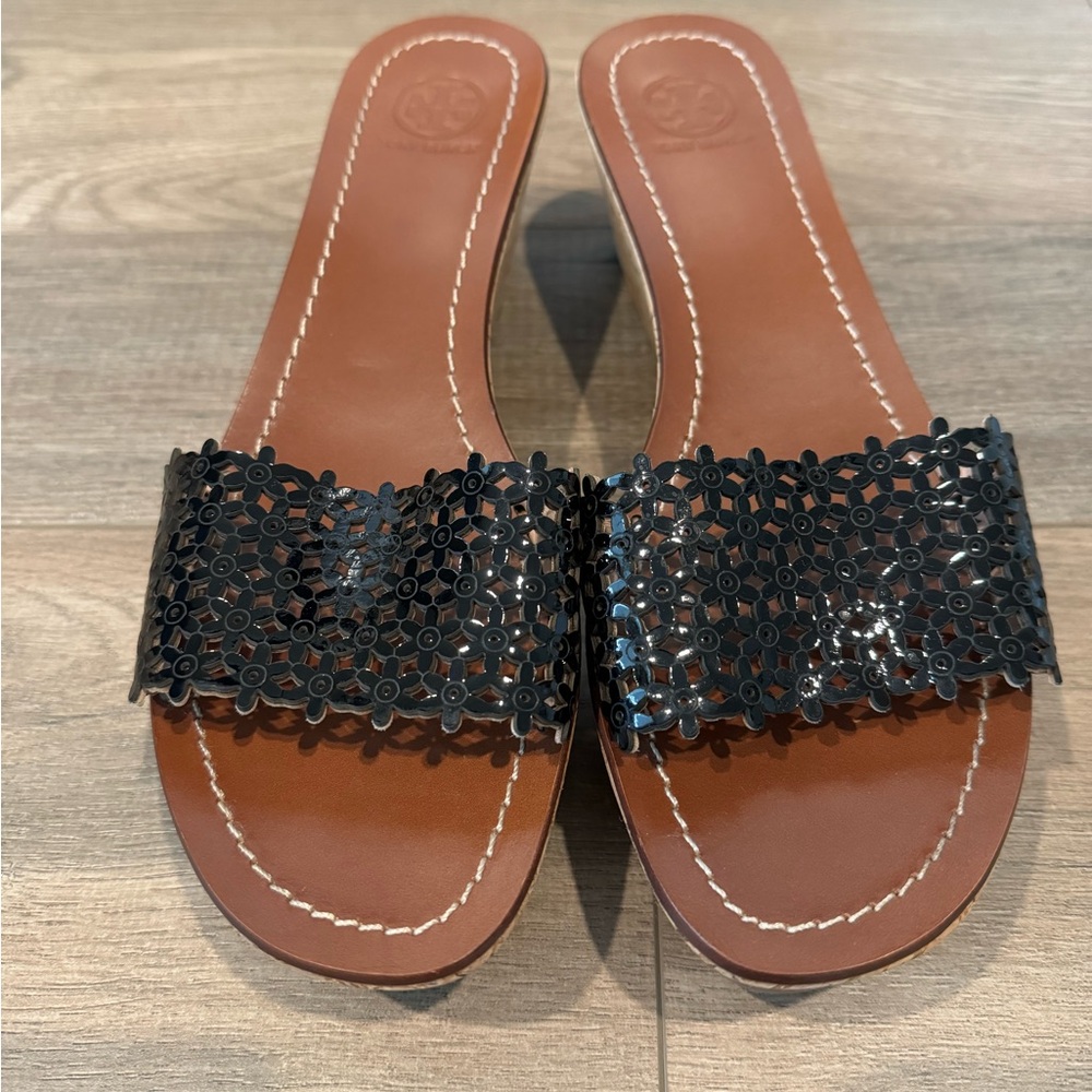 Tory Burch black daisy patent leather wedges